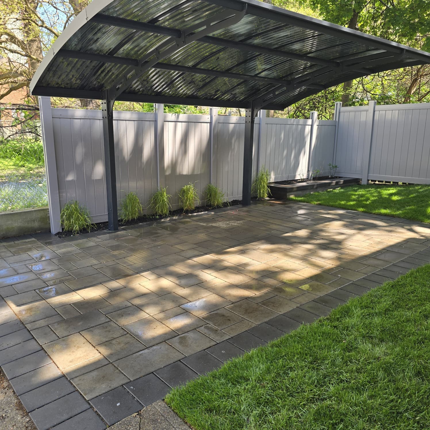 The Covered Carport Patio - hardscaping project in Toronto, ON